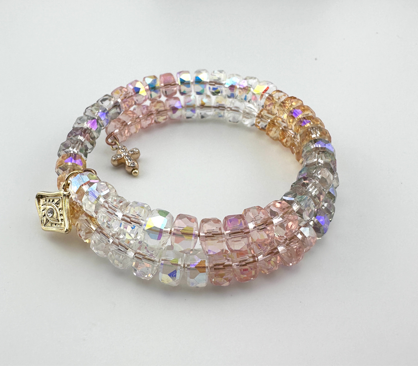 Radiant AB Crystal Memory Wire Bracelet – Triple Wrap with Gold-Plated Evil Eye & Pavé Cross Charms