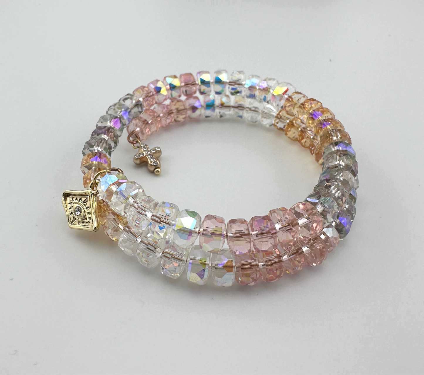 Radiant AB Crystal Memory Wire Bracelet – Triple Wrap with Gold-Plated Evil Eye & Pavé Cross Charms