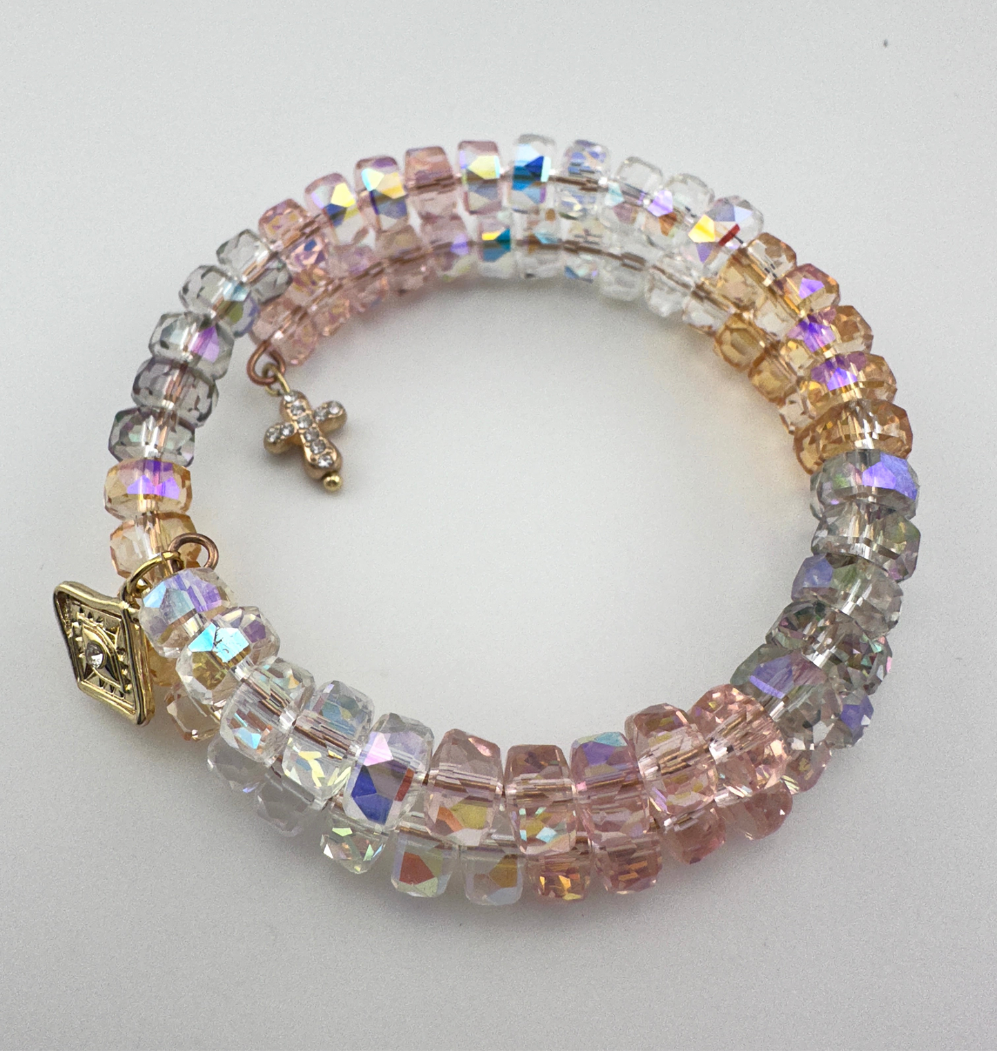 Radiant AB Crystal Memory Wire Bracelet – Triple Wrap with Gold-Plated Evil Eye & Pavé Cross Charms