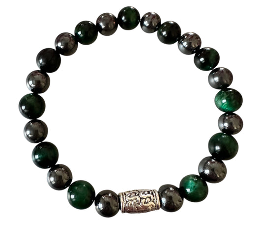 Handmade men’s bracelet with deep green tiger eye and black-silver hematite beads, accented by an engraved silver-tone barrel 