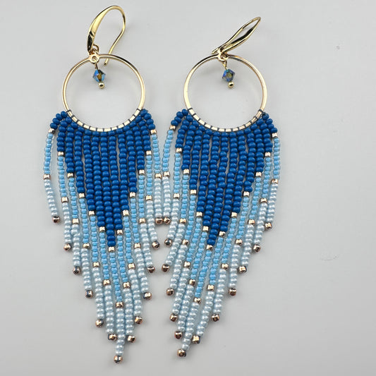 
Handmade gold hoop earrings with ombré blue Miyuki seed beads in a long fringe design 