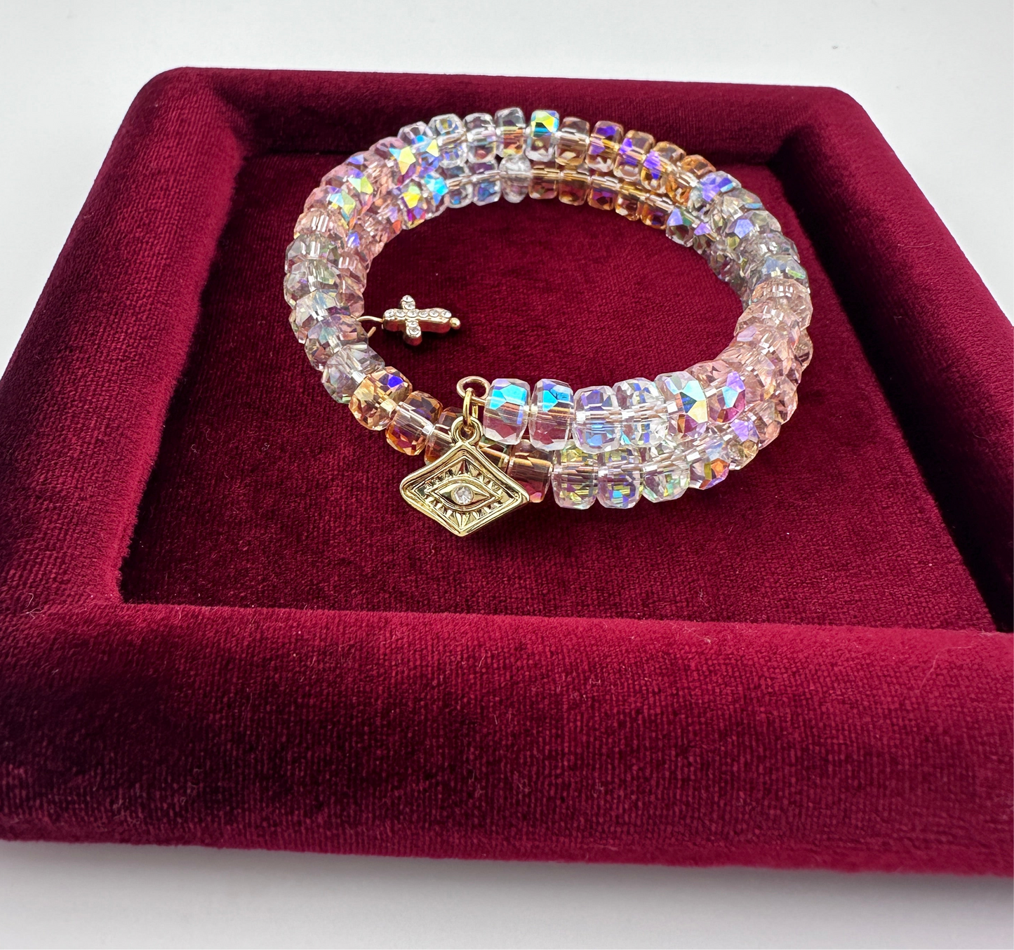 Radiant AB Crystal Memory Wire Bracelet – Triple Wrap with Gold-Plated Evil Eye & Pavé Cross Charms